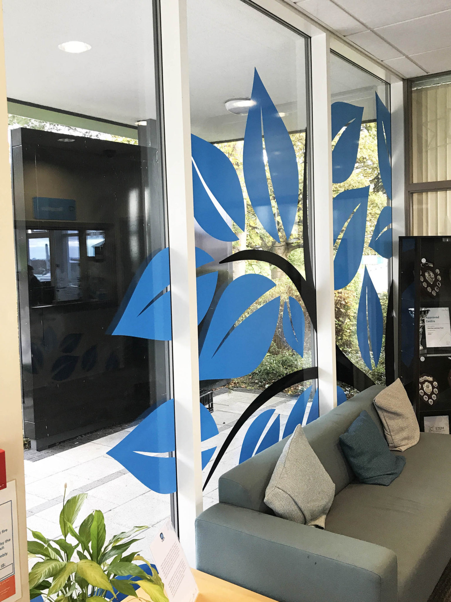 solid-colour-glass-window-partition-graphics-manifestation-school-logo ...